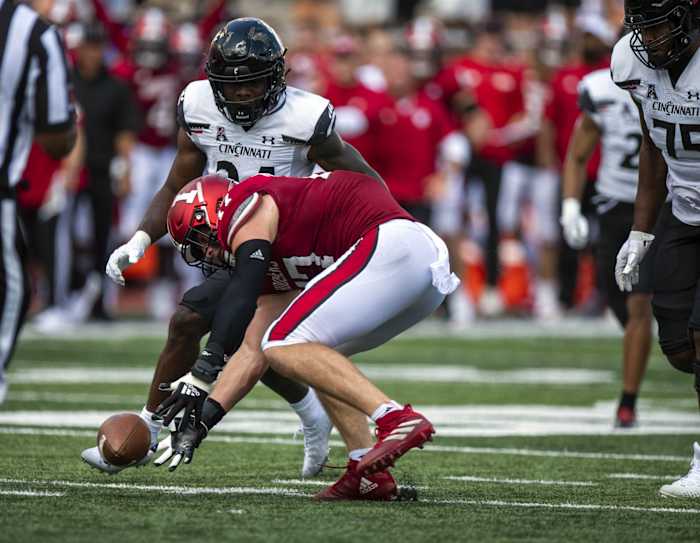 Sep 18, 2021; Bloomington, Indiana, USA; Indiana Hoosiers linebacker Micah McFadden (47) recovers a fumble during the second quarter against the Cincinnati Bearcats at Memorial Stadium.